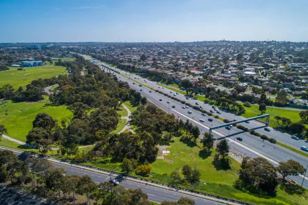 Melbourne city skyline with modern cars